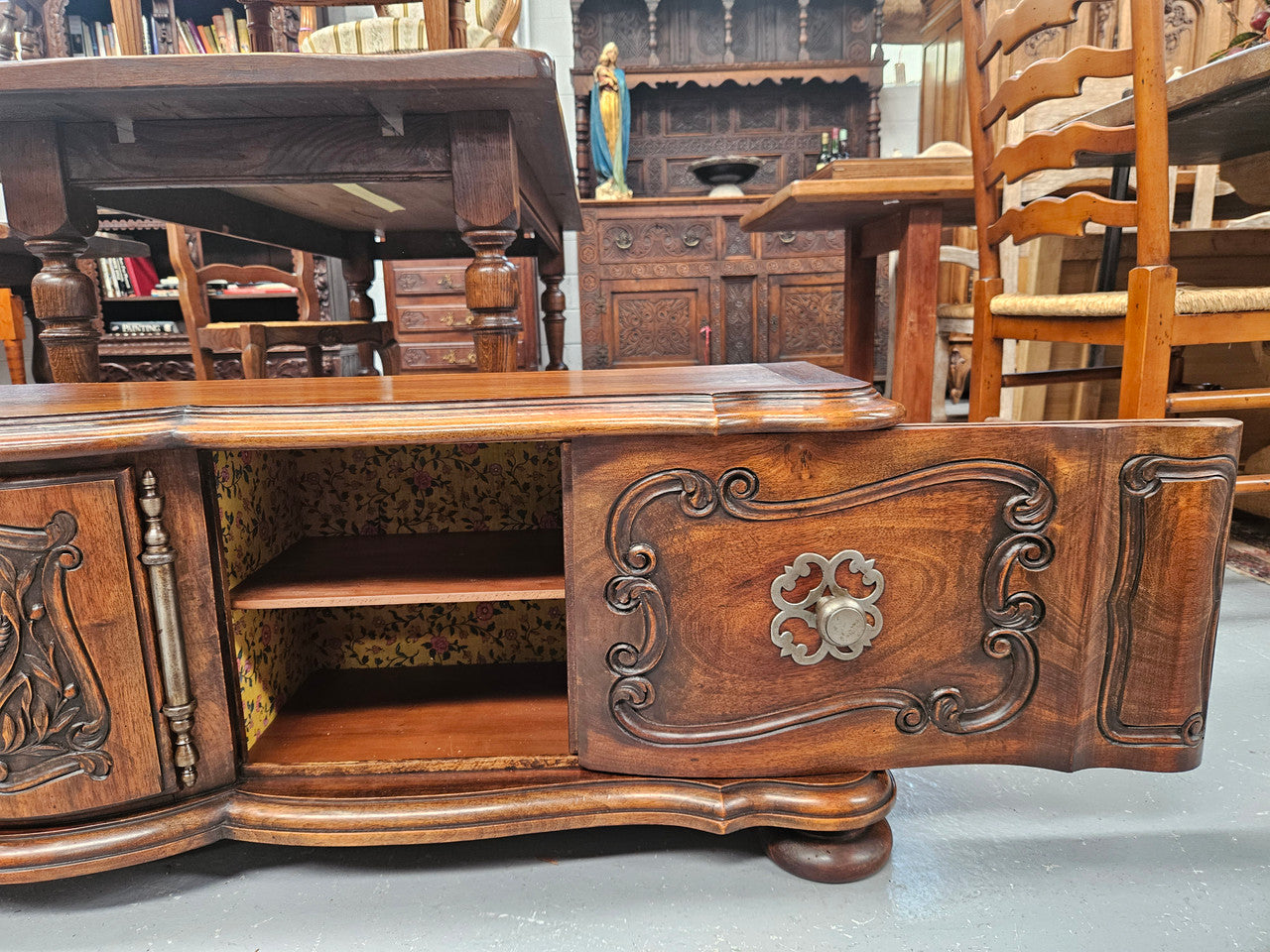 Appealing French Louis XVth style walnut converted TV unit.  Central carved  door & 2 Sliding Cupboards. In good condition.
