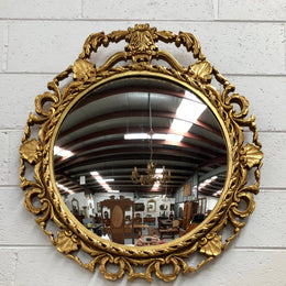 Lovely French round, gilt floral convex mirror. Mirror has lovely detail and in good condition.

Mirror diameter is 49 cm.