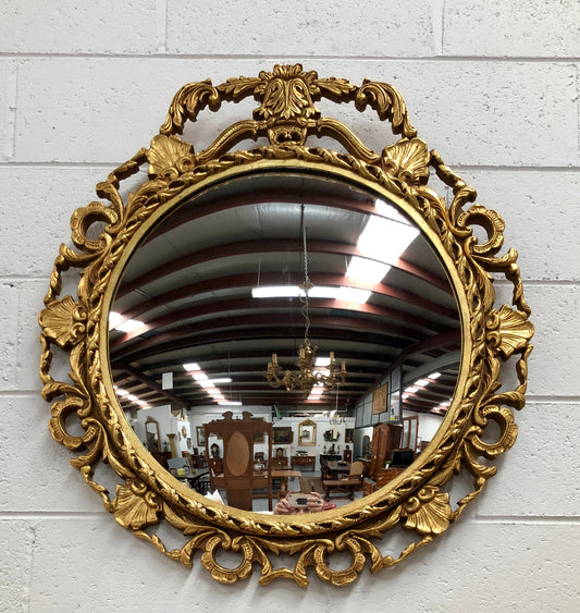 Lovely French round, gilt floral convex mirror. Mirror has lovely detail and in good condition.

Mirror diameter is 49 cm.
