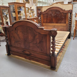 French 19th Century Walnut Henry II style queen sized bed with Barley Twist posts. Bed comes complete with custom made slats. Just place your mattress on top. In good original detailed condition.