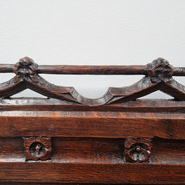 Early 19th Century French Oak Gothic style hall seat with a lift up seat. It has amazing detailed carvings and is in good original detailed condition.