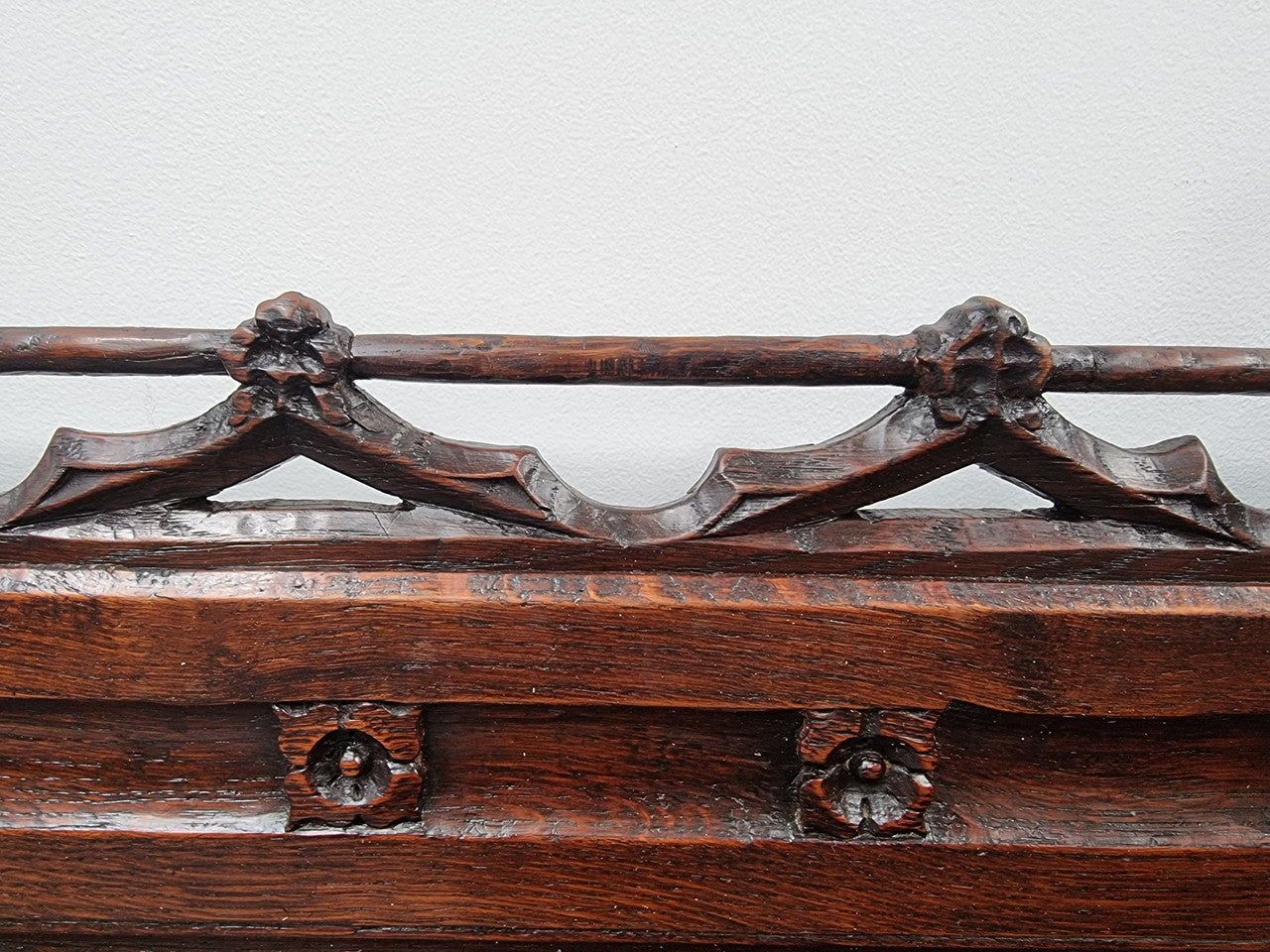 Early 19th Century French Oak Gothic style hall seat with a lift up seat. It has amazing detailed carvings and is in good original detailed condition.