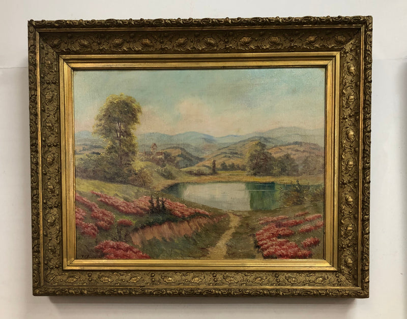 Beautiful French country scene oil on canvas in a lovely decorative frame in good original condition..