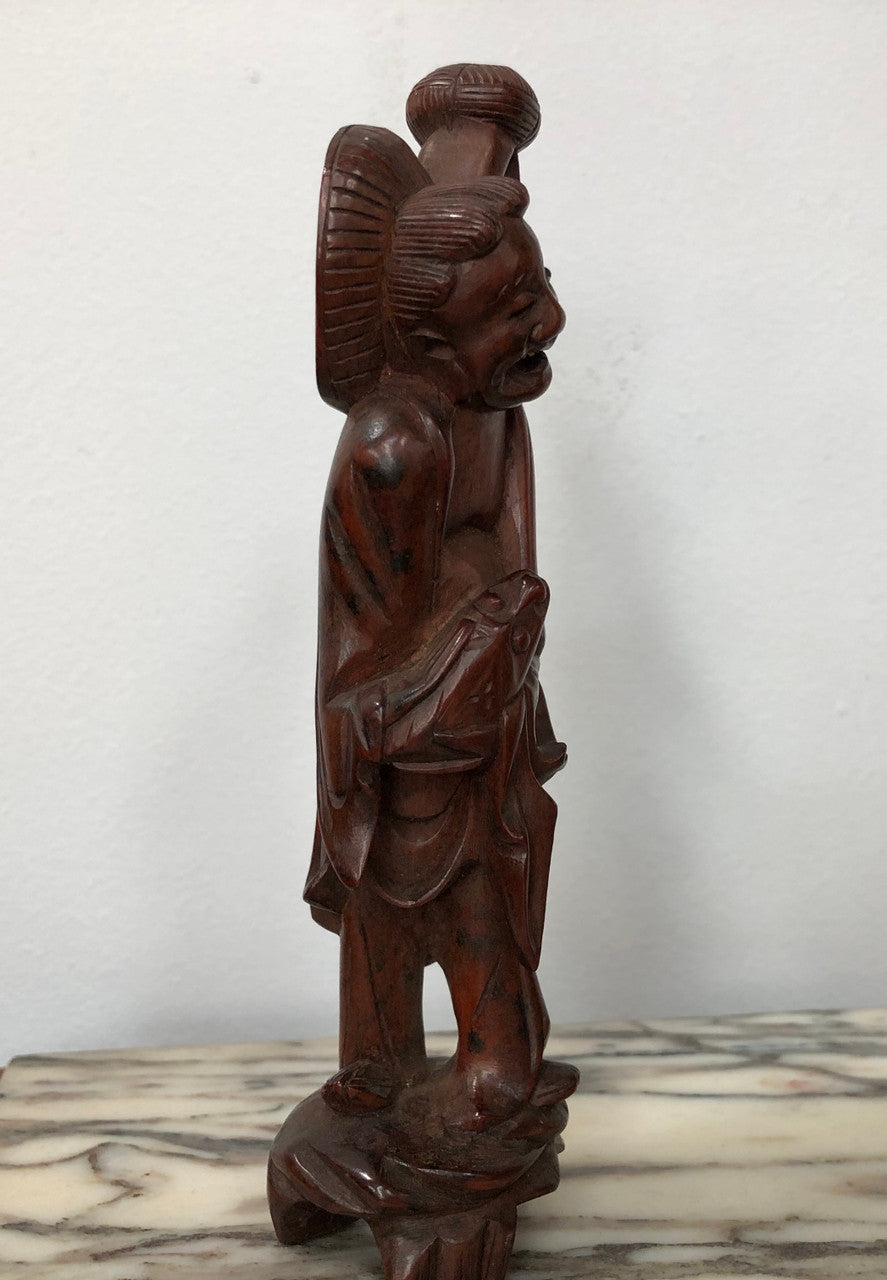 Vintage Chinese carved rosewood figure on wooden stand. In good original condition.