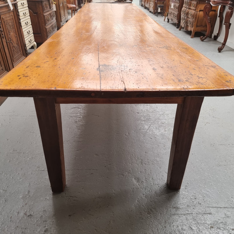 Extremely rare one piece top Kauri Pine Australian farmhouse table. It is truly an amazing table with loads of character, it comfortably seats 14 to 16 people. In good original detailed condition and sourced locally.