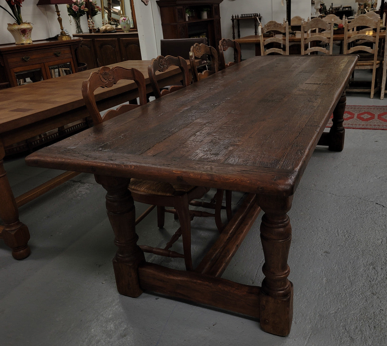 Amazing 2.65 meter French Elm Refectory dining table with loads of rustic charm. This table has been sourced from France and can comfortably seat ten people. It is in good original detailed condition.