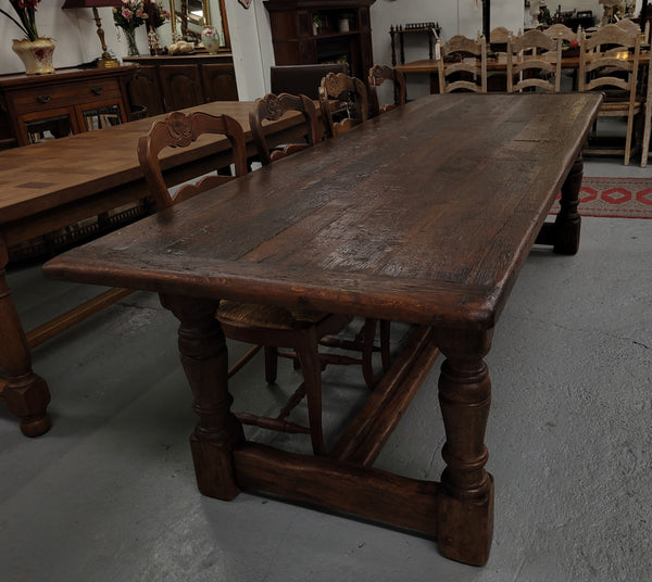 Amazing 2.65 meter French Elm Refectory dining table with loads of rustic charm. This table has been sourced from France and can comfortably seat ten people. It is in good original detailed condition.