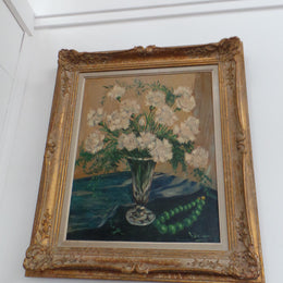 A beautiful impressionist style painting of carnation flowers oil on canvas. It is in a lovely decorative frame. It is in very good original condition.