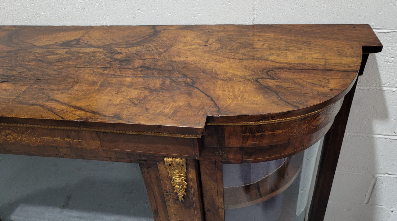 Victorian Rosewood inlaid side cabinet/credenza with velvet lined shelves and gilt mounts. It has been sourced locally and is in good original condition with loads of character.