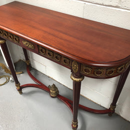 Fully restored decorative French style mahogany console table, with beautiful ormolu mounts and in very good condition.