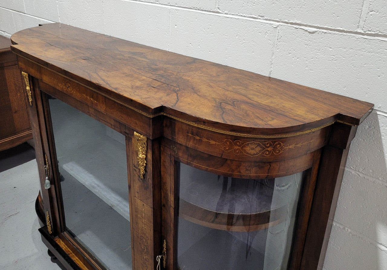 Victorian Rosewood inlaid side cabinet/credenza with velvet lined shelves and gilt mounts. It has been sourced locally and is in good original condition with loads of character.