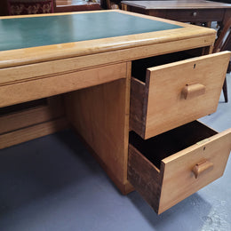 Parliament house desk made from Queensland maple. Desk has room numbers stamped to front. It's in good original condition. Purchased from a sale in old Parliament House in the late 1980's.