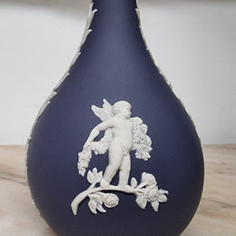 Wedgwood blue and white Jasper Ware bud vase. It is in good original condition with no chips or cracks, please view photos as they help form part of the description.