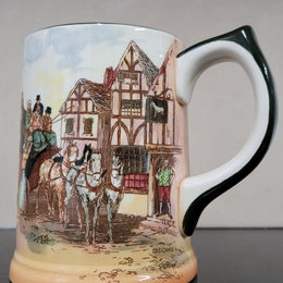Royal Doulton coaching scene mug. In good original condition please view photos as they help form part of description.