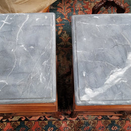 Pair of unusual transitional fruit wood marble top bedside cabinets. They have been sourced from France and are in good original detailed condition.