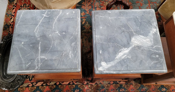 Pair of unusual transitional fruit wood marble top bedside cabinets. They have been sourced from France and are in good original detailed condition.