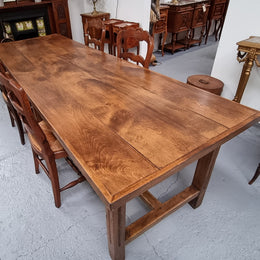 Fabulous French Cherrywood farmhouse dining table with a stretcher base and would easily sit 10 people comfortably in fantastic condition.
