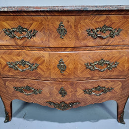 Attractive French marble top Louis XV style three drawer commode with decorative ormolu mounts. In good original detailed condition.