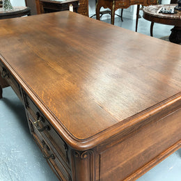 French Oak Louis XV style full partners desk with both sides having five functional drawers. In very good original detailed condition.
