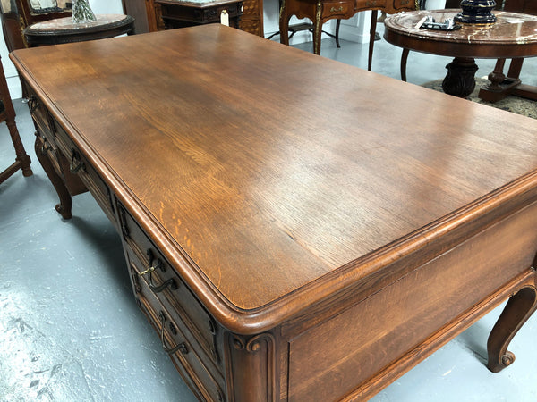 French Oak Louis XV style full partners desk with both sides having five functional drawers. In very good original detailed condition.