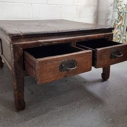 Square Elm coffee table with oriental legs and two long drawers.  Beautifully finished and in good original condition. It has been sourced from France.