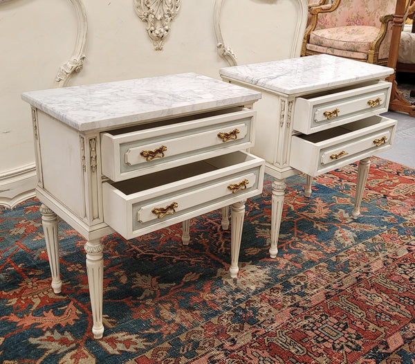 Attractive pair of Vintage French Louis 16th style two drawer marble topped bedsides. They have been sourced from France and are in good original condition.