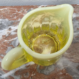 A fabulous rare Vaseline glass small jug and sugar bowl in good original condition.