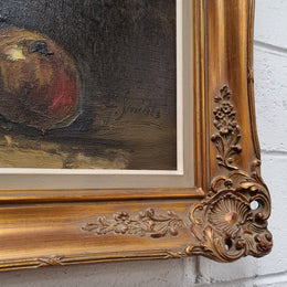 Beautiful signed oil on canvas of a still life framed in an ornate frame. Sourced in France and in good original condition.