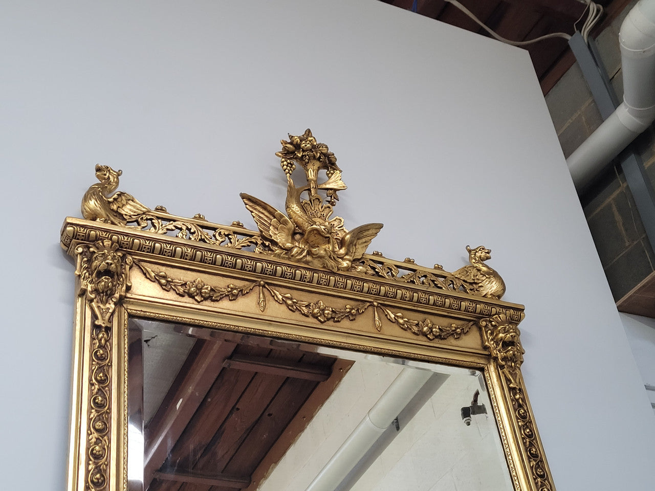 Impressive French Napoleon III water gilded mantle mirror. It is beautifully decorated with allegorical themes and has been sourced from France. In good original detailed condition with original mirror.