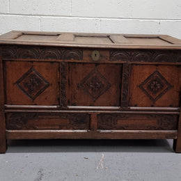Early 19th Century French Oak carved coffer with a lift up lid for storage. A beautiful piece and in good original condition.