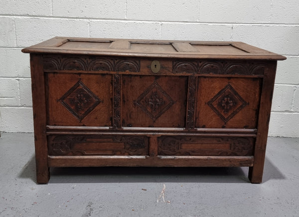 Early 19th Century French Oak carved coffer with a lift up lid for storage. A beautiful piece and in good original condition.