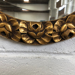 Beautiful French decorative Art Deco giltwood wall mirror with lovely floral detail. Contains its original mirror and is in good original condition.