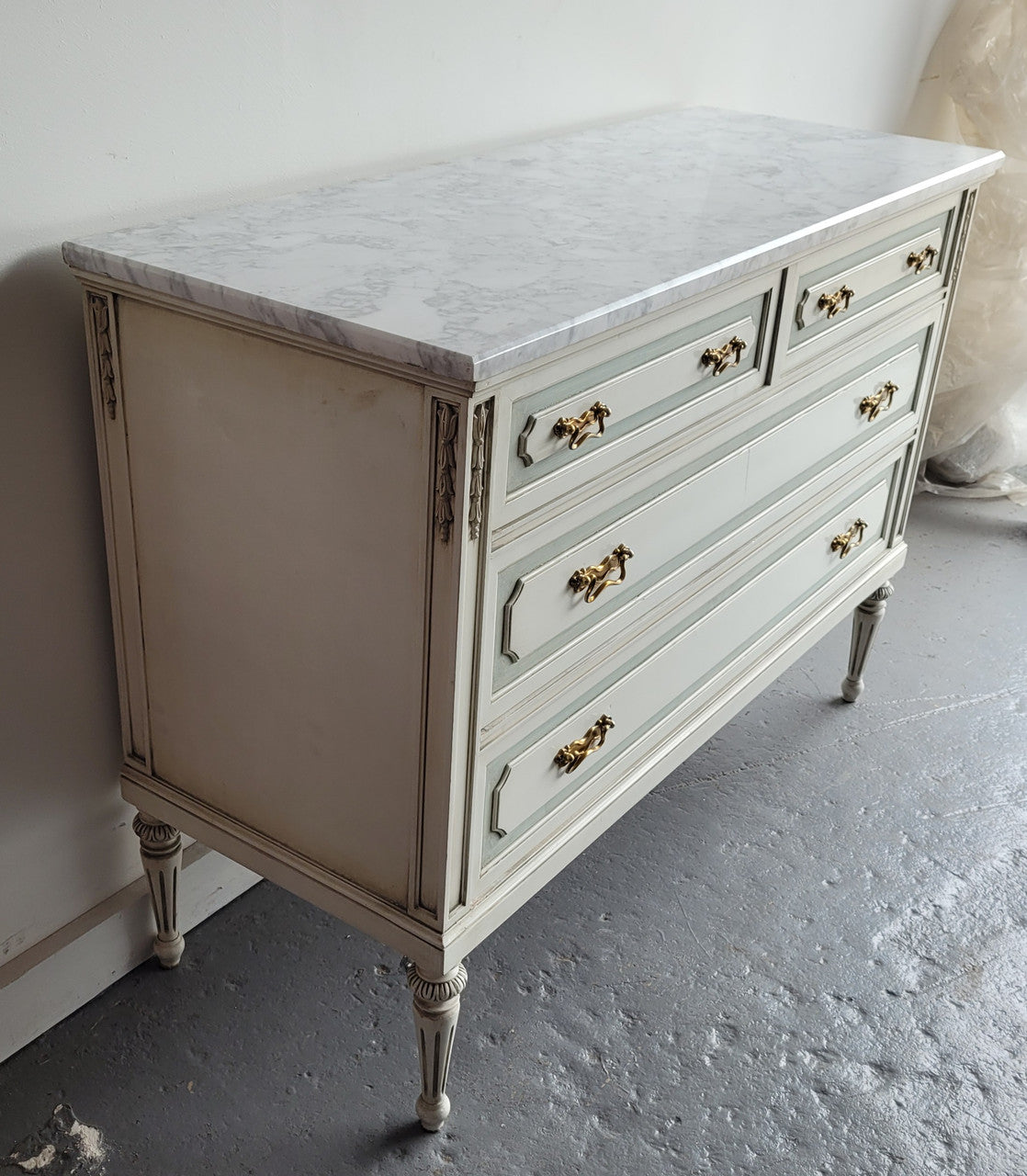 Charming Vintage French Louis 16th style original chalk painted chest of four drawers. It has been sourced from France and in good original condition.