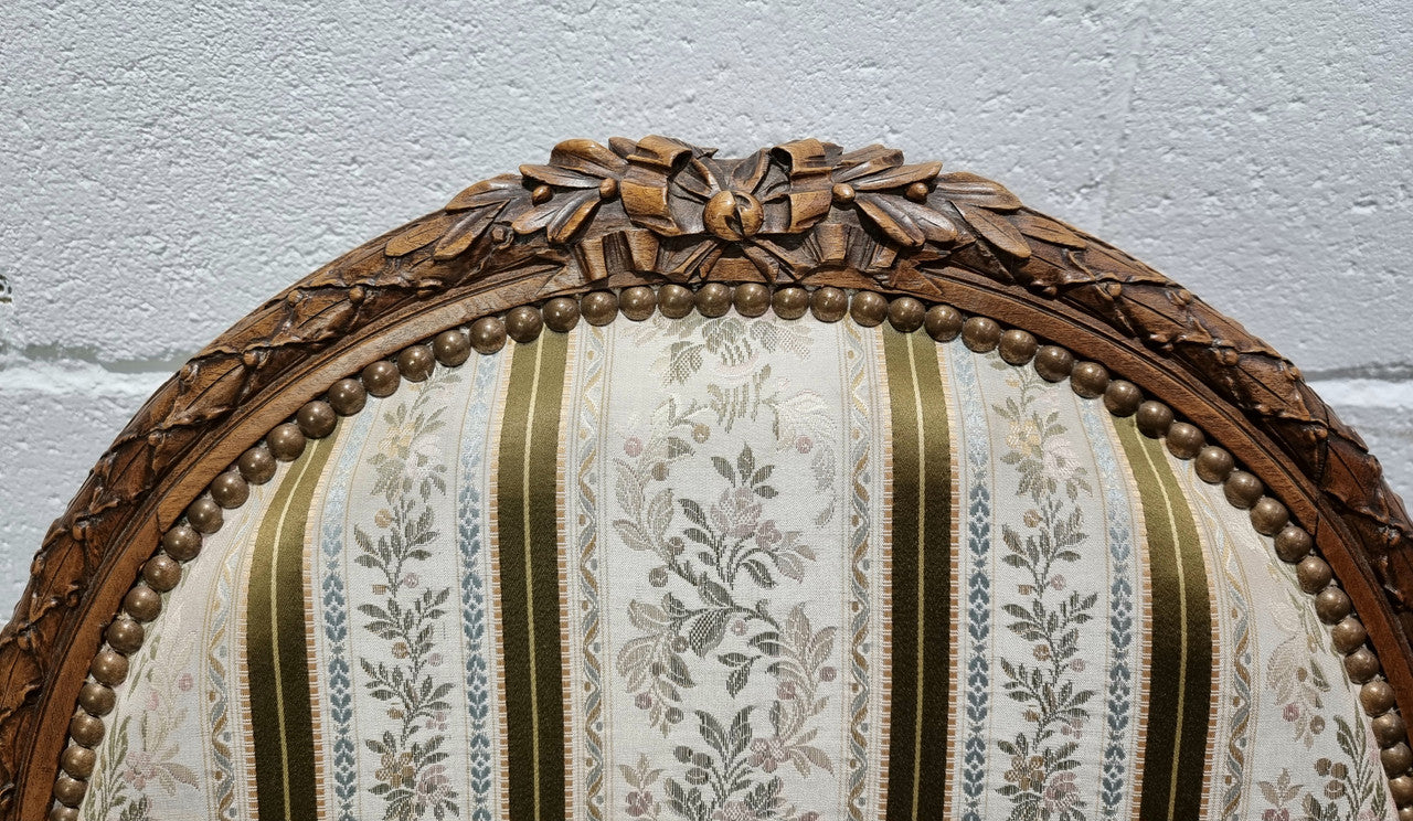 Pair of French Louis XV matching carved armchairs. They are in good overall condition with some slight wear to fabric, please view photos as they help form part of the description.