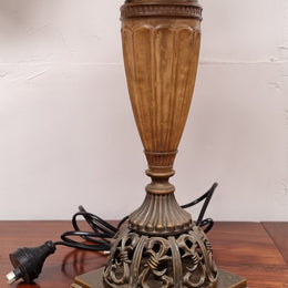 Beautiful pair of metal and glass lamp bases with new gold shades. They are in good original working condition and have been sourced locally.