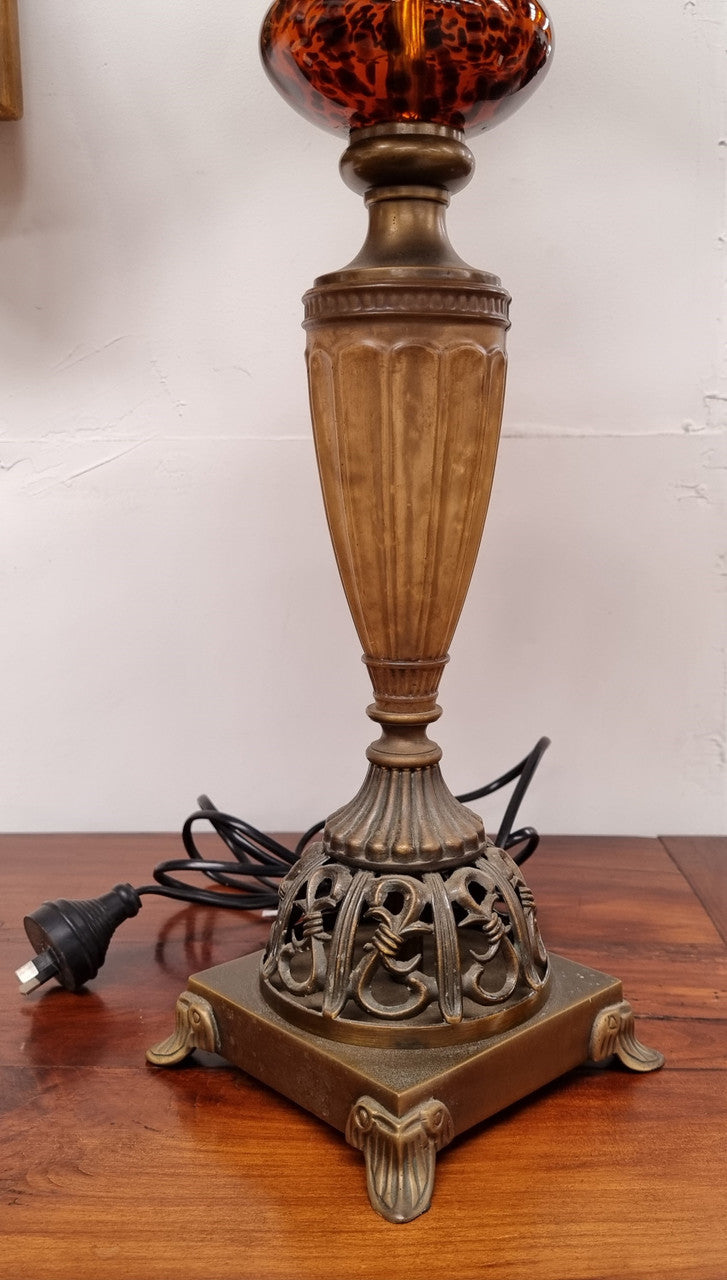 Beautiful pair of metal and glass lamp bases with new gold shades. They are in good original working condition and have been sourced locally.