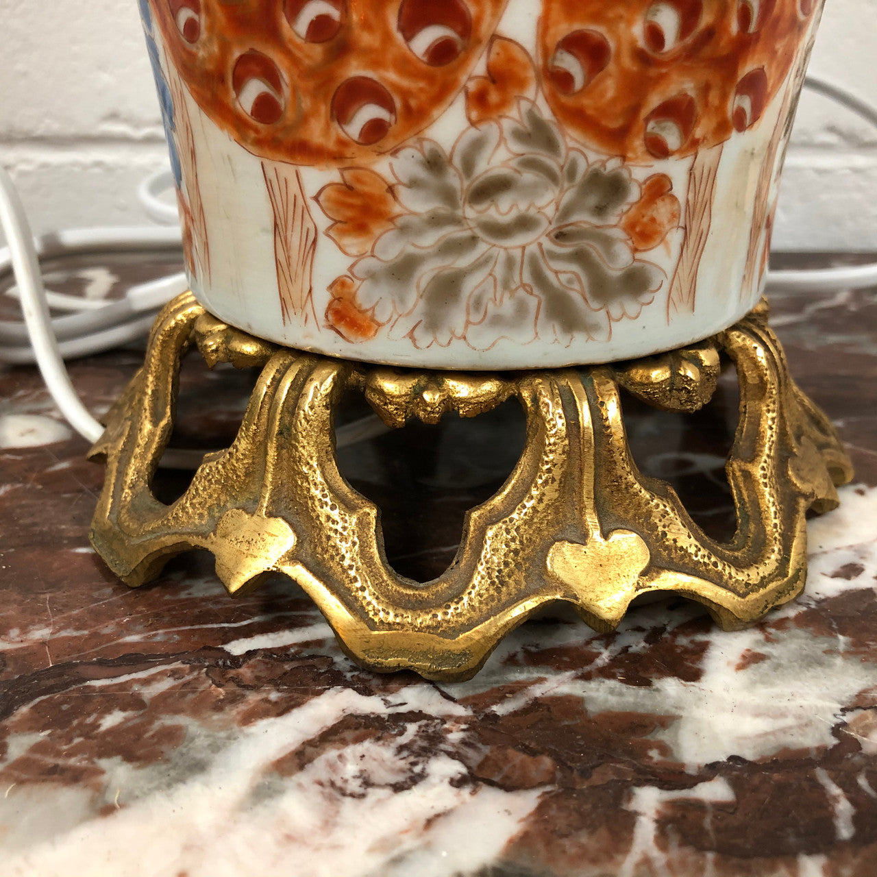 Stunning Japanese Imari style base with detailed french ormolu mounts. It is in good original working condition.