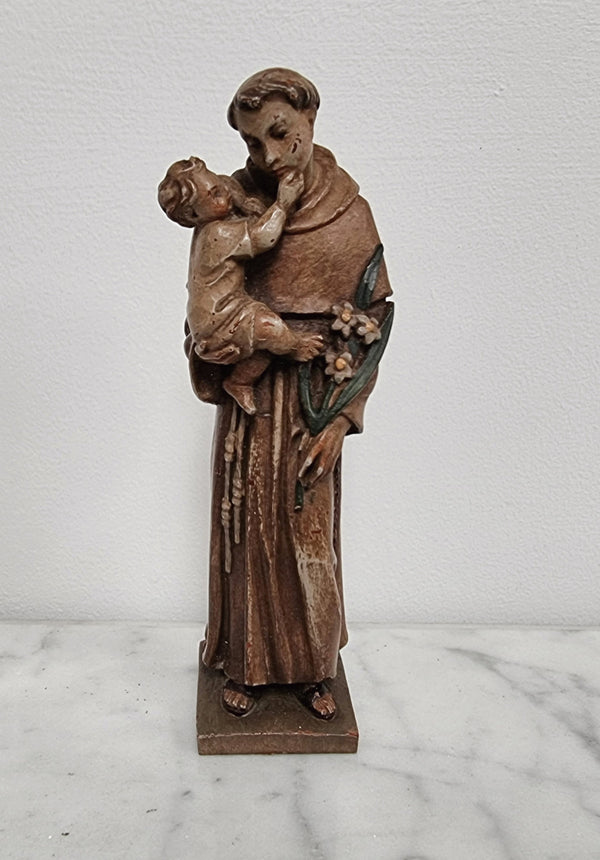 Vintage wood carved St. Anthony and baby Jesus statuette. Hand painted and is in good detailed condition.