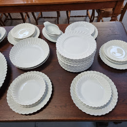 Limoge "Haviland" large white part dinner service. Includes some white service with gilt decoration. Although most items are in good condition please note two plates do have small chips. We are able to supply more photos on request.
