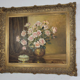 Delightful Gilt Framed signed oil on Canvas. Depicting bowl of Roses. In good original condition.