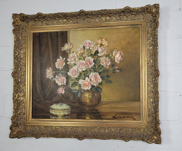 Delightful Gilt Framed signed oil on Canvas. Depicting bowl of Roses. In good original condition.