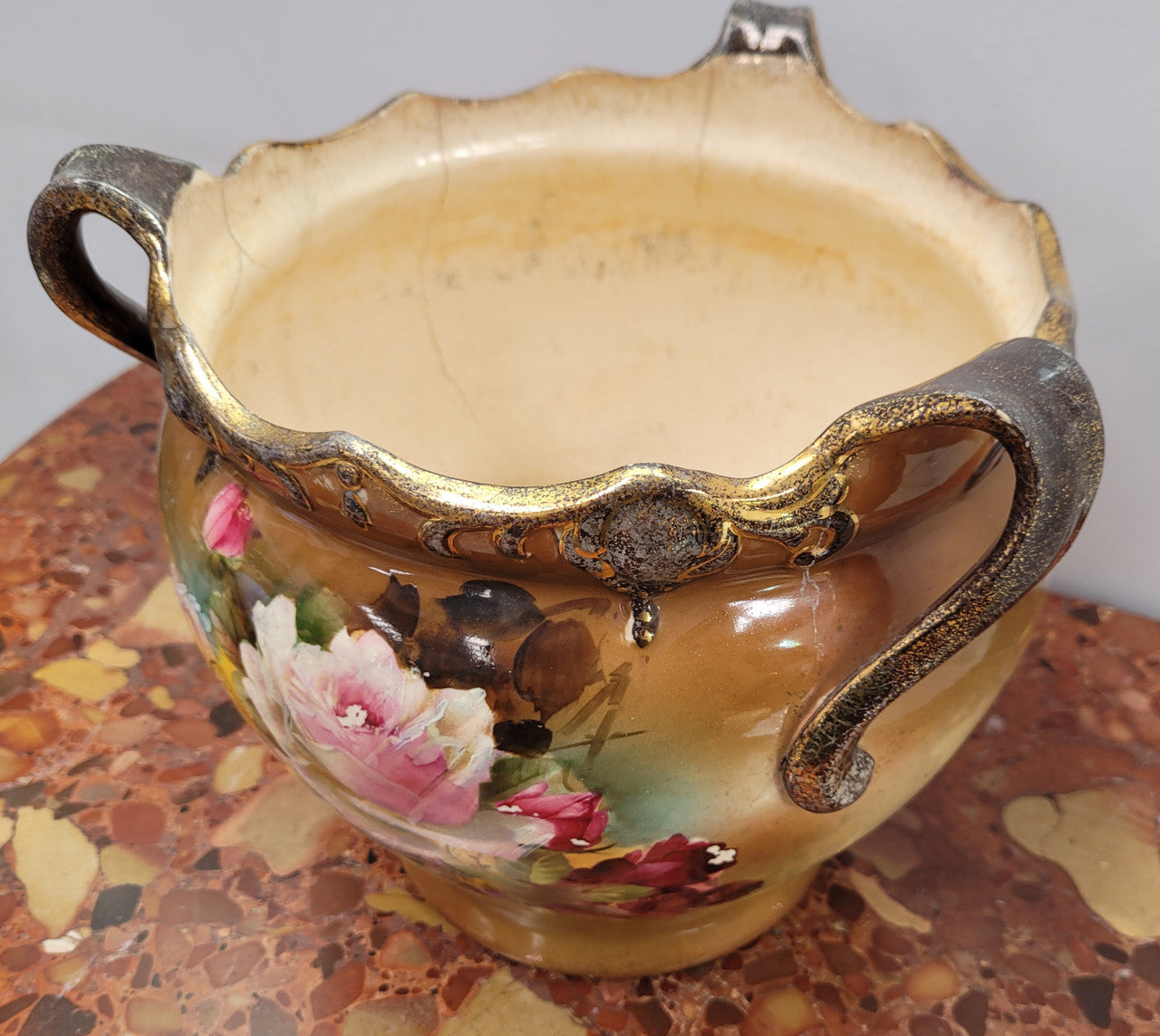 Pretty Antique three handled floral jardinière. Please note that it is being sold in as found condition, please view photos as they help form part of the description.