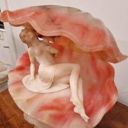 A superb original hand carved Art Deco lamp. Alabaster and marble sculpture of a nude woman inside a clam shell. Italian, inscription to base. Circa 1920's. Subtle colouring to clam shell for a sunset effect. This is a world class example of a true Art Deco sculpture lamp. It is in good original detailed condition, please view photos as they help form part of the description.