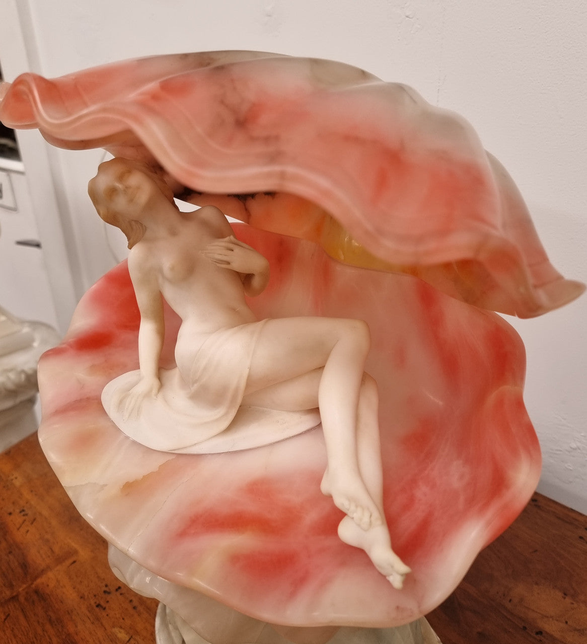 A superb original hand carved Art Deco lamp. Alabaster and marble sculpture of a nude woman inside a clam shell. Italian, inscription to base. Circa 1920's. Subtle colouring to clam shell for a sunset effect. This is a world class example of a true Art Deco sculpture lamp. It is in good original detailed condition, please view photos as they help form part of the description.