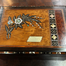 Superb Victorian Inlaid Walnut & Amboyna Jewellery Box. Also has mother of peral and metal, once opened it has a mirror on the lid. It also comes with a key to lock the box, it is in very good original condition.