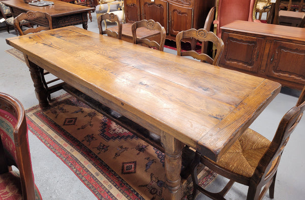 Large impressive 19th century 2.5 meter Antique French Oak farmhouse table. Loads of character with a stunning solid thick top and has a long drawer at one end. Sourced from France and in good original detailed condition.