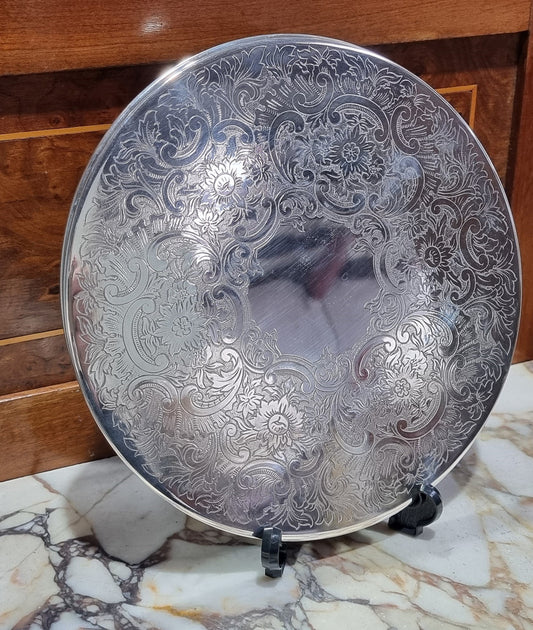 Two Strachan 30cm Silver Plate center table coasters. In good original condition.
