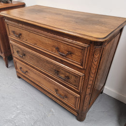 French solid Oak Louis 14th style chest of three drawers. It has three large spacious drawers and it has been sourced from France. It is in good original detailed condition.