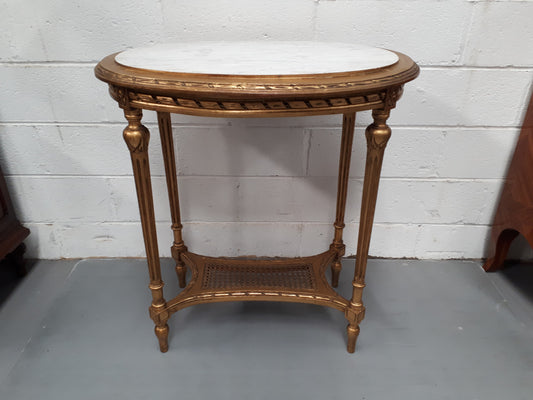 Antique French 19th century Louis XVI style oval inset marble top & giltwood salon/side table. In good condition. Circa 1890.