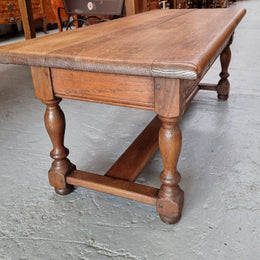 Fabulous Rustic French Oak coffee table with two drawers. It is in good original detailed condition.